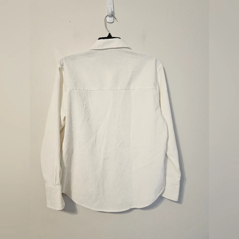 Zara button-up shirt with long sleeves and a single chest pocket